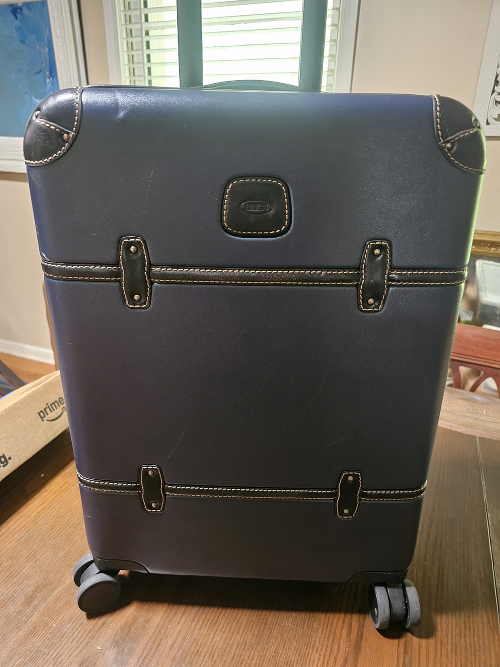 Bric's Navy Carry-On Spinner – Classic Leather-Trim Luggage